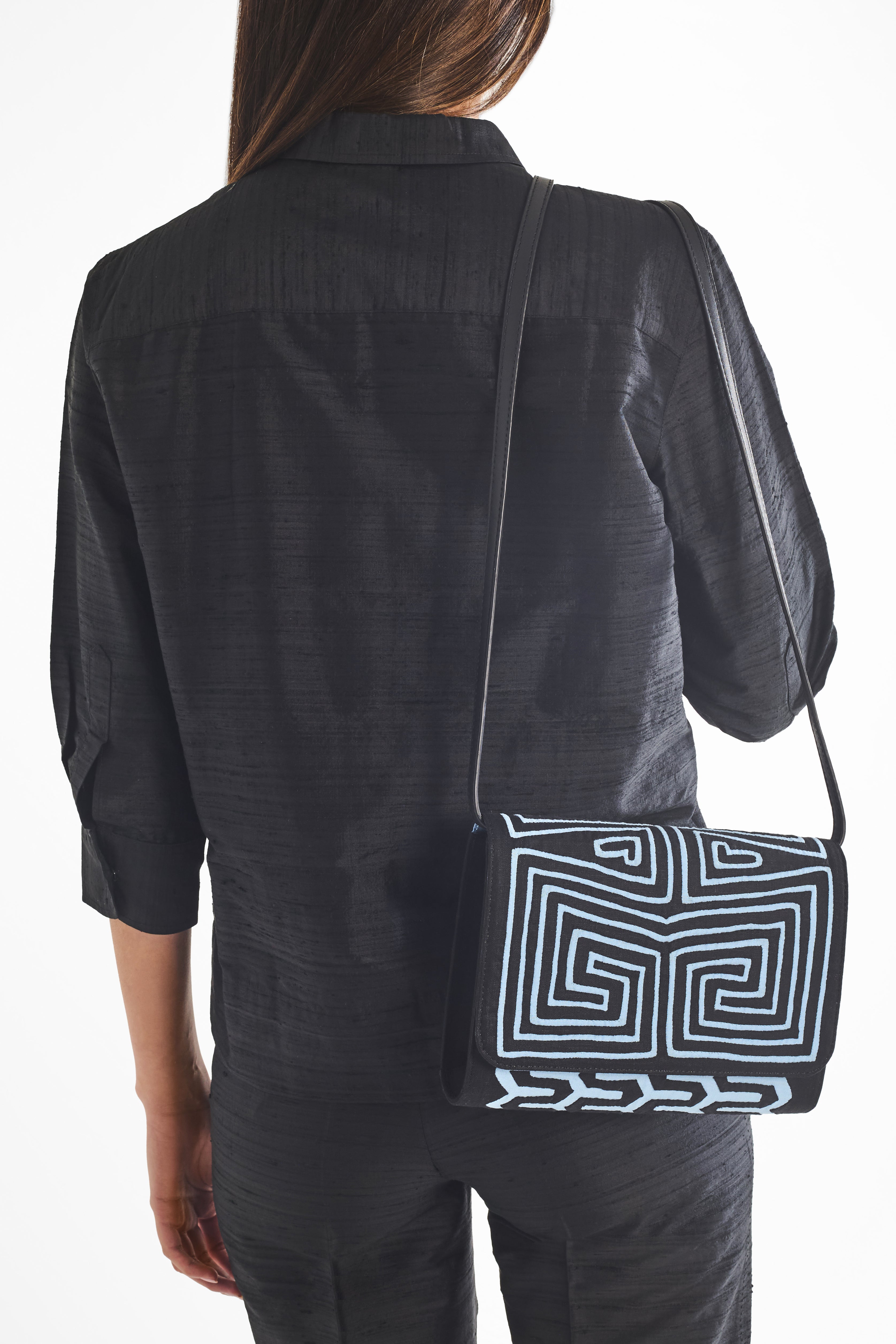 MAISI IN LIGHT BLUE CLUTCH